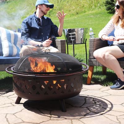 Image showing 6 th Sunnydaze Decor 36 in. Camping or Backyard Crossweave Cut Out Wood-Burning Fire Pit with Spark Screen and Metal Grate, Bronze