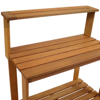 Image showing  Outdoor Meranti Wood with Teak Oil Finish Gardening Potting Bench with Shelf, 35.5 x 17.75 x 42.75 in., Brown