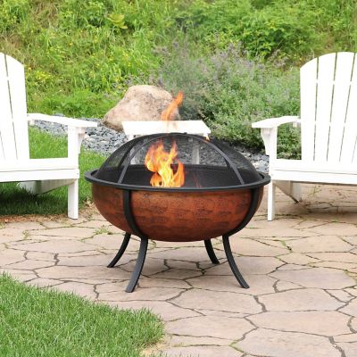 Image showing 9 th Sunnydaze Decor 32 in. Raised Outdoor Wood-Burning Fire Pit Bowl with Spark Screen, 0.7 mm Steel, High Temp Copper Finish