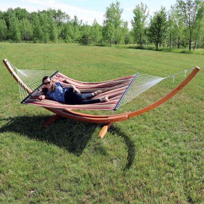Image showing  Quilted Double Fabric 2-Person Hammock, Curved Arc Wood Stand, 400 lb. Weight Capacity, 13ft. Stand, Red Stripe