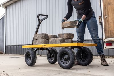 Image showing 12 th Gorilla Carts 7 cu. ft. 1,200 lb. Capacity Heavy-Duty Steel Utility Cart, Yellow