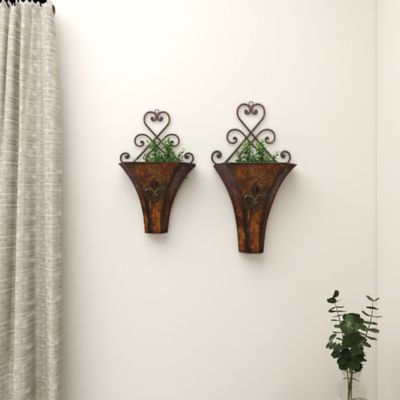 Harper & Willow Brown Metal Indoor Outdoor Hanging Scroll Wall Planter Set of 2 22 in., 18 in.H