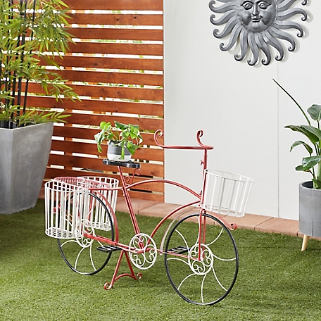 Harper & Willow Red Metal Indoor Outdoor Bike Plantstand with Basket and Saddle Bag Planters 52 in. x 18 in. x 33 in.