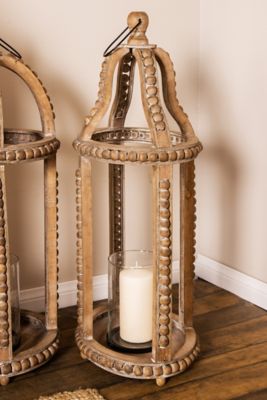 Harper & Willow 29 in. Rustic Cage-Style Wood Lantern with Glass Candle Holder