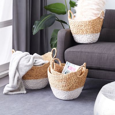 Cosmoliving by Cosmopolitan Large Oval Natural/White Dip-Dyed Water Hyacinth Wicker Storage Baskets, Round Handles, 4 pc.