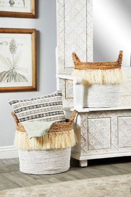 Cosmoliving by Cosmopolitan Large Round White Seagrass Baskets with Handles, Banana Bark and Fringe Detail, 2 pc.