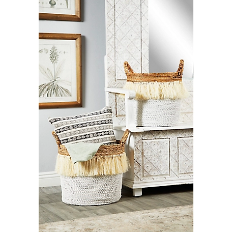 Cosmoliving by Cosmopolitan Large Round White Seagrass Baskets with Handles, Banana Bark and Fringe Detail, 2 pc.