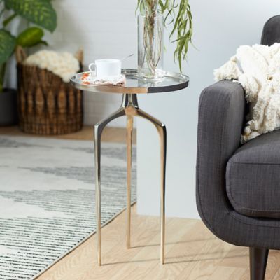 Harper & Willow Contemporary Round Silver Aluminum Raised Edge Accent Table, 25.19 in. x 15.88 in. x 15.88 in.