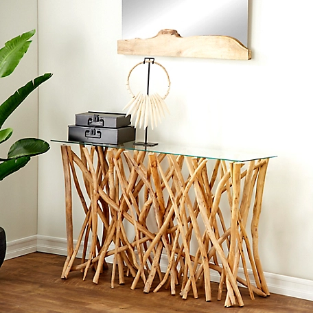 Harper & Willow Brown Teak Wood Handmade Tree Branch Console Table with Clear Glass Top 51" x 16" x 30"