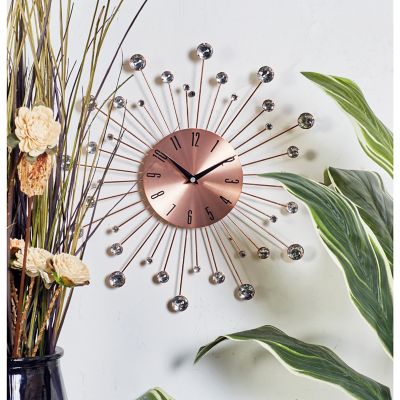 Harper & Willow Copper Metal Starburst Wall Clock with Crystal Accents 15" x 1" x 15"