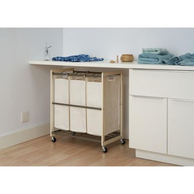 Image showing  3-Bag White Laundry Cart, Champagne poles
