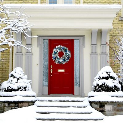 Fraser Hill Farm 24 in. Snow-Covered Artificial Christmas Wreath with Multi-Hued Blue Ornaments