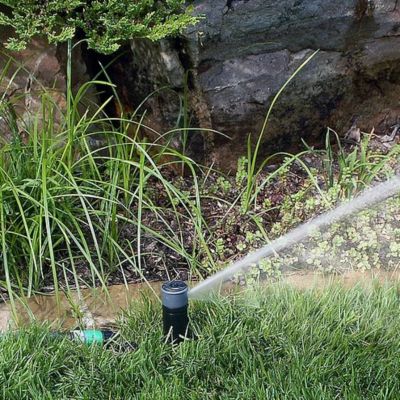 Image showing  5,000 sq. ft. Buried Sprinkler Kit, Orange Locator Cap, Adjustment Key, Hose Quick-Connect with Auto Stop