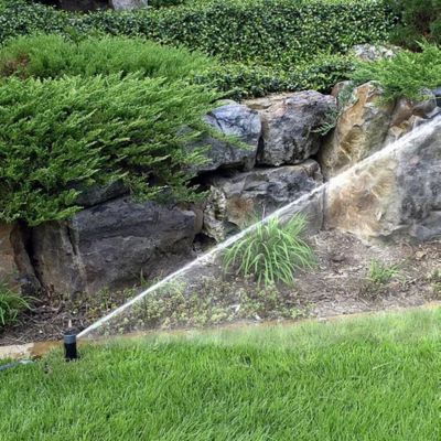 Image showing  5,000 sq. ft. Buried Sprinkler Kit, Orange Locator Cap, Adjustment Key, Hose Quick-Connect with Auto Stop