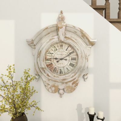 Harper & Willow Brown Fiberglass Carved Scroll Wall Clock with Distressing 34" x 6" x 44"