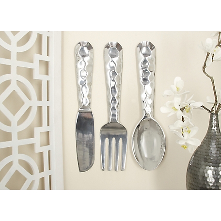 Harper & Willow Silver Aluminum Knife Spoon and Fork Utensils Wall Decor Set, 6 in. W x 23 in. H, 3 pc.
