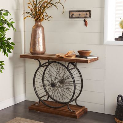 Harper & Willow Brown Wood Console Table with Dual Wheel Frame and Tiered Base, 39 in. x 25 in. x 12 in.