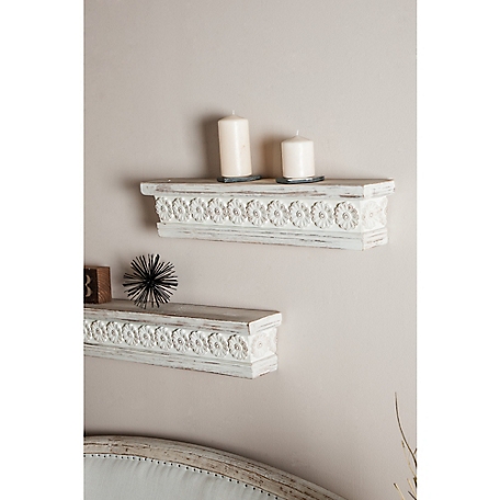 Harper & Willow White Wood Intricate Carved 1 Shelf Floral Wall Shelf 28" x 5" x 6"