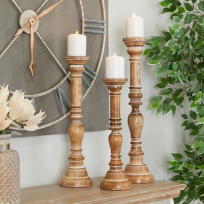 Harper & Willow Brown Mango Wood Handmade Candle Holder with Turned Style Set of 3 24 in., 21 in. and 17 in., 14343