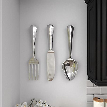 Harper & Willow Silver Aluminum Knife Spoon and Fork Utensils Wall Decor Set, 4 in. W x 23 in. H, 3 pc.