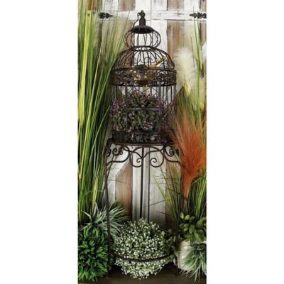 Harper & Willow Vintage Black Metallic Standing Bird Cage, 47 in. x 14 in. x 14 in.