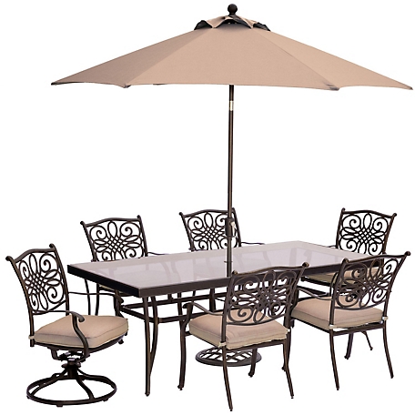 Hanover 7 pc. Traditions Dining Set, Includes Extra-Large Glass-Top Dining Table and Umbrella with Stand, Tan, 11 ft.