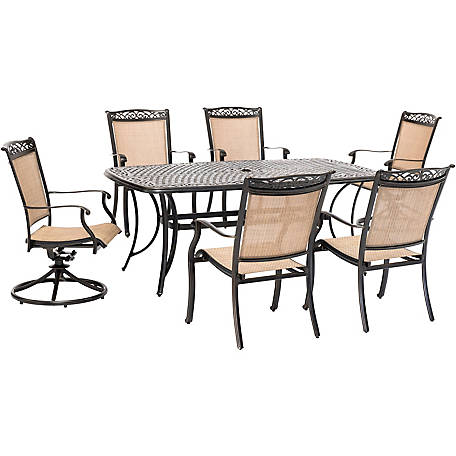 Hanover Fontana 7 Pc Outdoor Dining Set With 2 Sling Swivel Rockers 4 Chairs And A Cast Top Table Fntdn7pcsw2c At Tractor Supply Co - Hanover Naples Patio Furniture