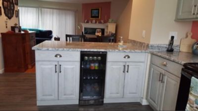 Image showing  15 in. Built-in 96 Can Beverage Fridge in Black Stainless Steel with Precision Temperature Controls & Adjustable Shelves