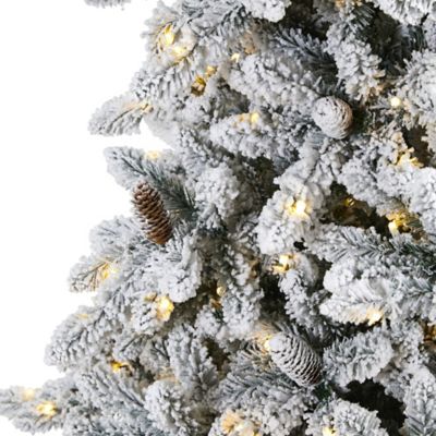 Image showing  9 ft. Flocked Livingston Fir Artificial Christmas Tree, Includes Pine Cones and 650 Clear Warm LED Lights