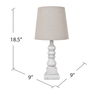 Image showing  18.5 in. H Distressed Resin Table Lamp, White