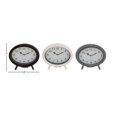 Image showing  Black Metal Traditional Clocks, 7 in. x 8 in. x 2 in.