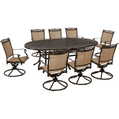 Hanover 9 pc. Fontana Outdoor Dining Set, Includes 8 Sling Swivel Rockers and 95 in. x 60 in. Oval Cast-Top Dining Table