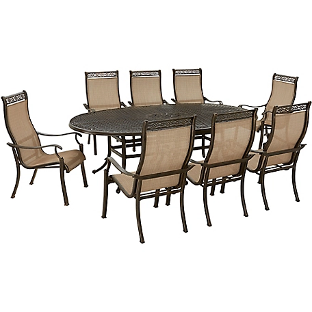 Hanover 9 pc. Manor Outdoor Dining Set, Includes 8 Sling Dining Chairs and 95 in. x 60 in. Oval Cast-Top Dining Table