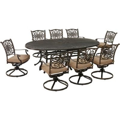 Hanover 9 pc. Traditions Dining Set, Includes 8 Swivel Rockers and 95 in. x 60 in. Oval Cast-Top Dining Table, Tan
