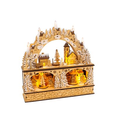 Gerson International 14.75 in. Battery Operated Lighted Laser Cut Wood Village Scene with Moving Figurine and Candles