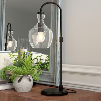 Image showing 7 th Hudson&Canal 27 in. Verona Blackened Bronze Arc Table Lamp with Clear Glass Shade
