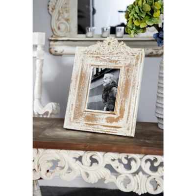 Harper & Willow 7 in. x 5 in. Wood Handmade Intricate Carved Scroll Photo Frame, 11 in. x 1 in. x 14 in., White