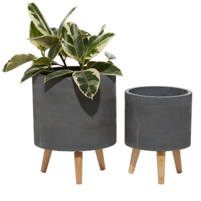 Image showing  Gray Ceramic Indoor Outdoor Planter with Wood Legs Set of 2 13 in., 16 in.H