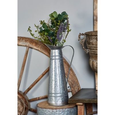 Harper & Willow Silver Metal Indoor Outdoor Watering Can Planter 9 in. x 7 in. x 20 in.