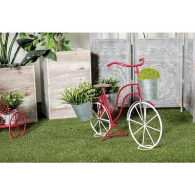 Harper & Willow Red Metal Indoor Outdoor Bike Plantstand with Basket and Saddle Bag Planters 31 in. x 15 in. x 23 in.