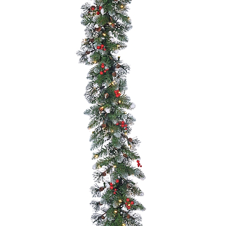 Gerson International 9 ft. Pre Lit Glazier Pine Garland with Iced Tips, Pine Cones, Red Berries, 100 Clear LED Lights