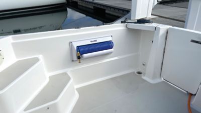 Image showing  Horizontal Mount Enclosure with 25 ft. Blue Coiled Hose, 5 ft. Feeder Hose and Nozzle