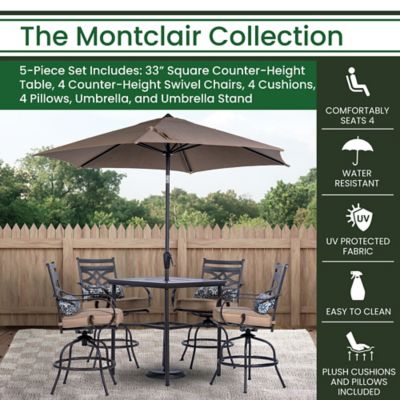Image showing  Montclair 5 pc. High-Dining Set in Tan, with 4 Chairs, 33 in. Counter-Height Table and 9 ft. Umbrella, MCLRDN5PCBR-SU-T
