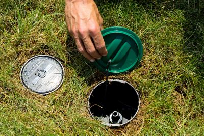 Image showing 5 th Rain Bird 5,200 sq. ft. In-Ground Sprinkler with Click-n-Go Hose Connect