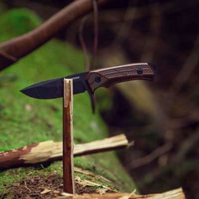 Image showing  4.25 in. Rock 62 Walnut Engraved Fixed Blade Knife