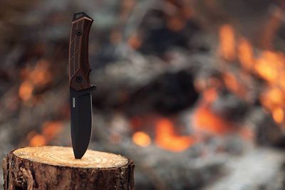 Image showing  4.25 in. Rock 62 Walnut Engraved Fixed Blade Knife