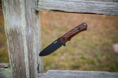 Image showing  4.25 in. Rock 62 Walnut Engraved Fixed Blade Knife