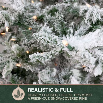 Image showing 7 th Fraser Hill Farm 9 ft. Pre-Lit Flocked Mountain Pine Slim Artificial Christmas Tree, Warm White LED Lights