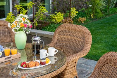 Image showing  5 pc. Sea Pines Mojave Wicker Outdoor Dining Set, 48 in. Round Table, Sunbrella and Canvas Cushions, Light Brown