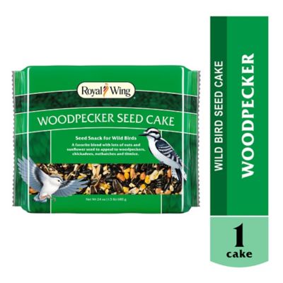 Royal Wing Woodpecker Seed Cake Bird Food, 24 oz. I really enjoy gardening it's not what I would call a hobby it is a full-time job I grow everything from zinnias daffodils tulips clematis hollyhocks irises canna lily calla lily columbine dahlias Flowers are my thing and with all of my flowers comes a lot of visitors the birds the bees even butterflies one thing I have a lot of is bird feeders 3 as you see this specific one is perfect for the Royal Wing woodpecker seed cake I have never used seed cake bird feed and it is so wonderful just look at the bird feeder I had and when you put regular bird food in it it would fall out this is perfect for my bird feeder there's a woodpecker or 2 out here and tons of tutmice birds it's less messy the bird seed is lasting a lot longer because the birds got to work to get it I love that it's not as messy has essential ingredients for birds  I am always outside gardening doing yardwork refilling my bird feeders or trimming rose bushes the birds love this feed  I definitely will be getting this bird seed cake again